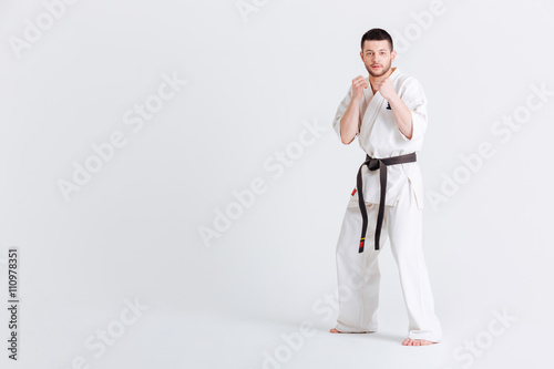 Man standing in fight stance