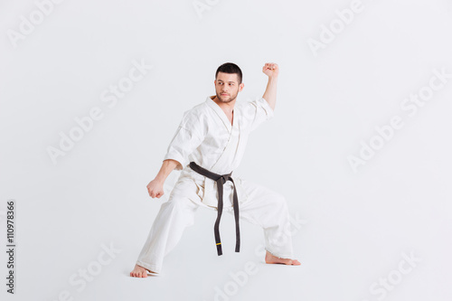 Male fighter standing in defensive stance
