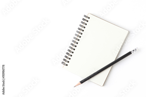 Blank notebook with pencil isolated on white background.
