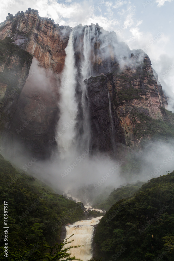 Angel Falls (Salto Angel), the highest waterfall in the world (978 m), Venezuela. Covered in clouds during the rainy season. Angel Falls (Salto Angel), the highest waterfall in the world (978 m), Venezuela. Covered in clouds during the rainy season.