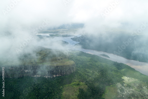 Aerial view of river Caroni and one of the tepuis  table mountains  in Venezuela