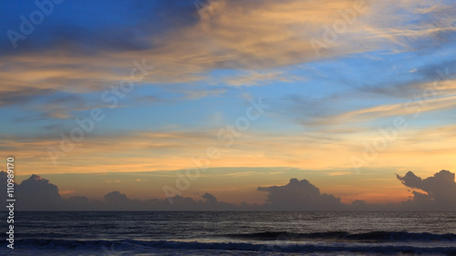 beautiful sunrise sky in the morning with colorful cloud on sea