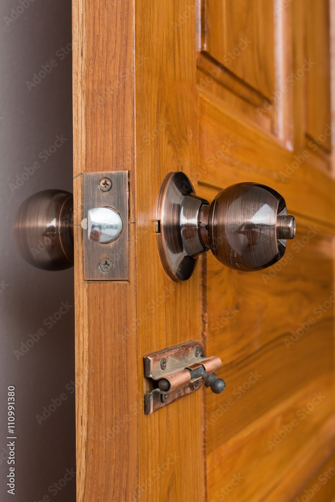 door knob and keyhole on wooden door door knob and keyhole on wooden door