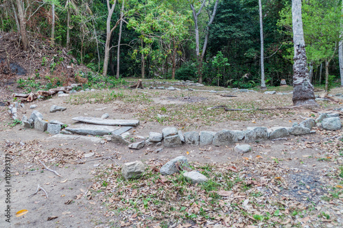 Remnants of a house of indigenous Kogi people in Tayrona National Park, Colombia photo