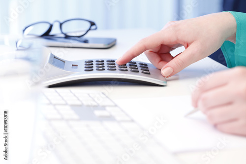 Businesswoman working on financial plan