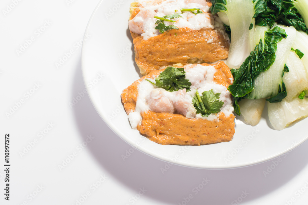 Steam seafood with curry paste on white background , Thai food,