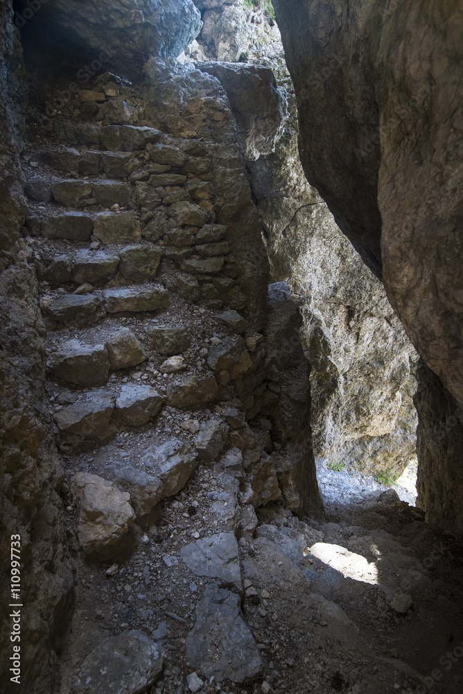 Natural stone steps in a crevice in the canyon