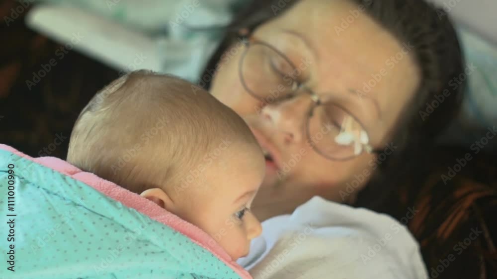 Grandmother holding her granddaughter
Grandmother holding her granddaughter