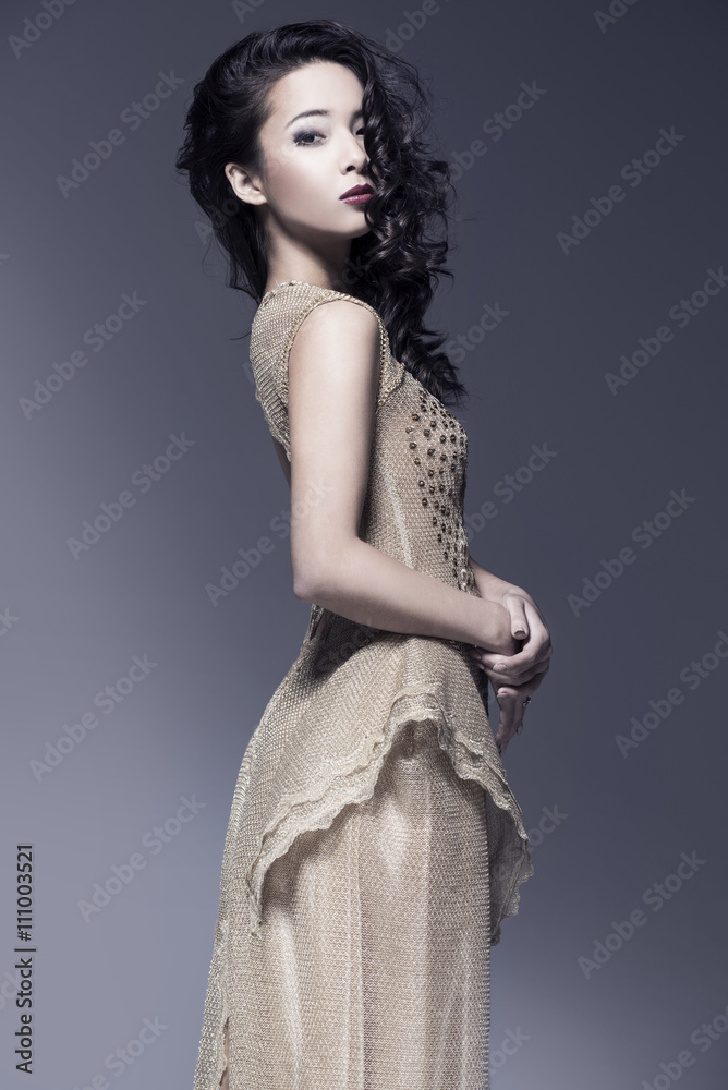 Fototapeta premium Beautiful woman in evening dress.