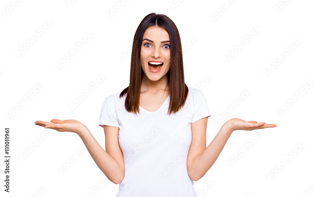 Sometimes it's hard to make the choice. Cropped portrait of a young woman holding copy spaces in both hands and looking at camera while standing against white background Sometimes it's hard to make the choice. Cropped portrait of a young woman holding copy spaces in both hands and looking at camera while standing against white background