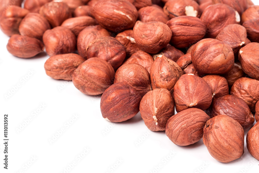 peeled hazelnuts isolated on white background macro peeled hazelnuts isolated on white background macro