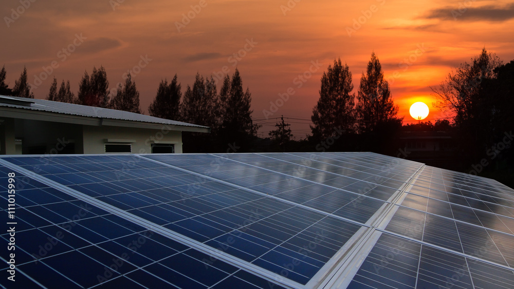 Solar panel with sunrise, rooftop - obrazy, fototapety, plakaty 