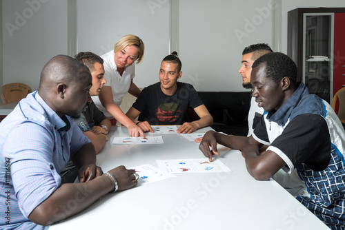 Foto Language training for refugees in a German camp