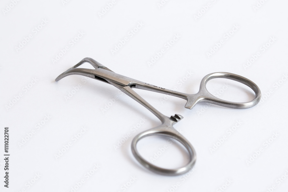 surgical instruments and tools including , forceps and tweezers White background surgical instruments and tools including , forceps and tweezers White background