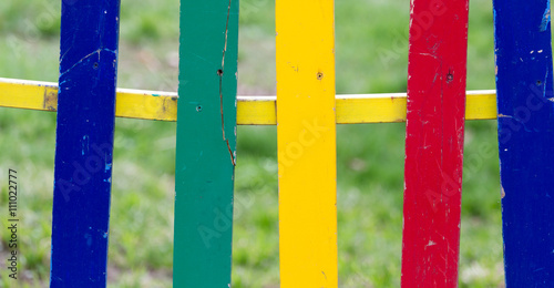 multicolored wooden fence as a backdrop