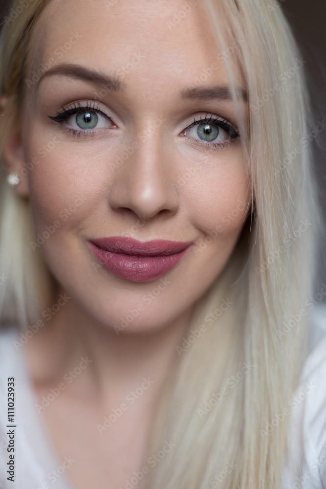 close-up portrait of beautiful young blond woman close-up portrait of beautiful young blond woman