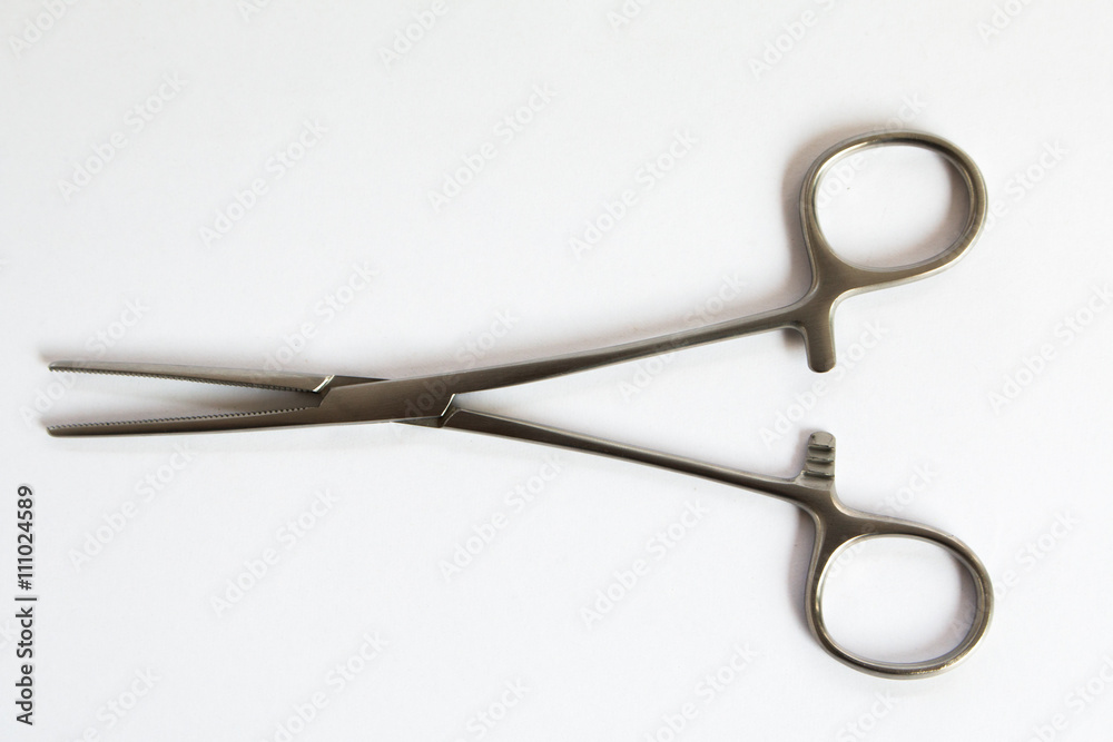 surgical instruments and tools including , forceps and tweezers White background surgical instruments and tools including , forceps and tweezers White background