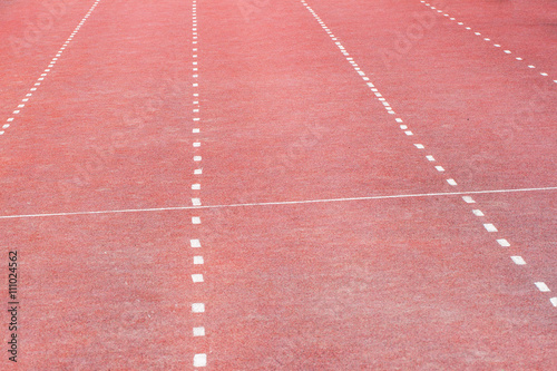 Old sport red treadmill at the stadium closeup