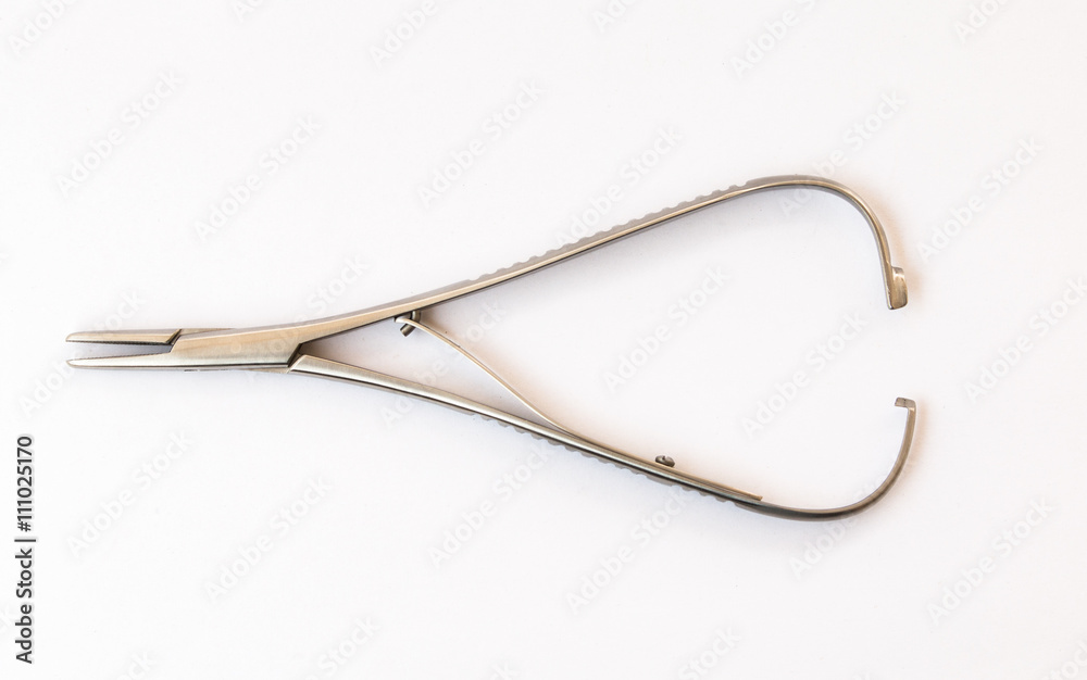 surgical instruments and tools including , forceps and tweezers White background surgical instruments and tools including , forceps and tweezers White background