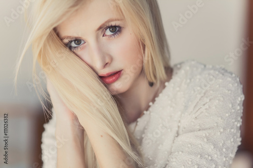 Fototapeta Naklejka Na Ścianę i Meble -  Blond Hair. Beautiful Sexy Blonde Girl. Beauty isolated on a Black Background