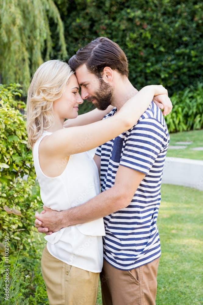 Romantic young couple embracing each other