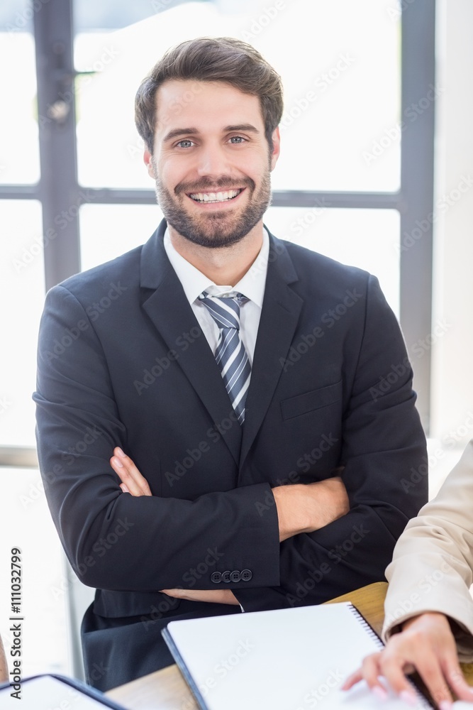 A businessman is smiling and posing A businessman is smiling and posing