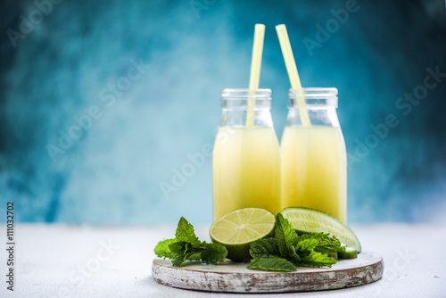healthy green smoothie with lime mint and cucumber