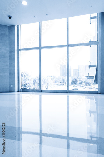 glass floor in modern building with glass windows