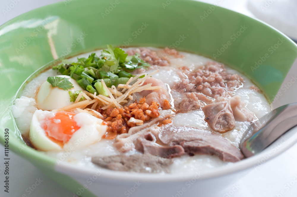Rice porridge, rice gruel, congee rice soup with egg and pork Rice porridge, rice gruel, congee rice soup with egg and pork
