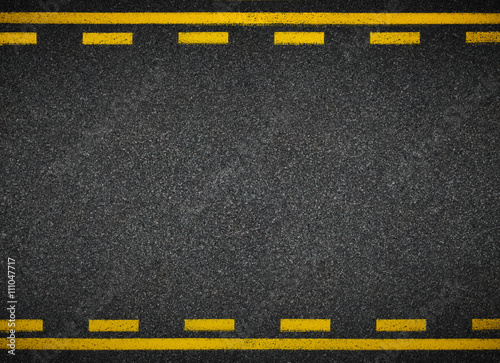 Road top view. Asphalt highway yellow line marks.