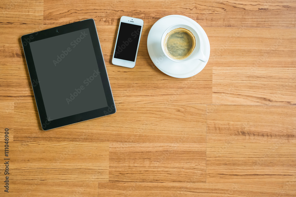 tablet, smart phone, coffee on the wood table tablet, smart phone, coffee on the wood table