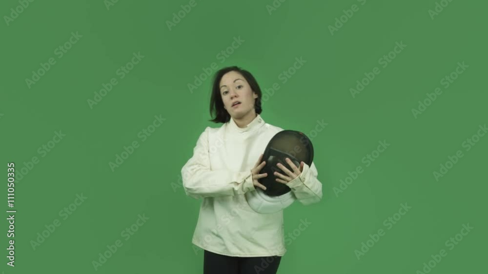 caucasian fencing with sword girl isolated on green screen silence with secret caucasian fencing with sword girl isolated on green screen silence with secret