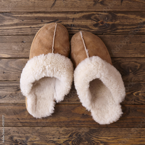 Slippers on a wooden floor