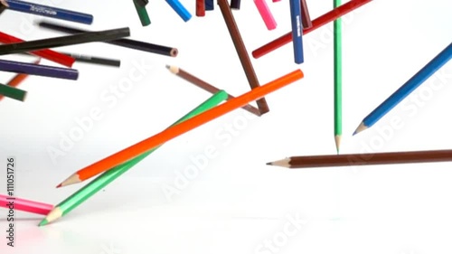 Wallpaper Mural Colouring pencils falling on white background in slow motion Torontodigital.ca