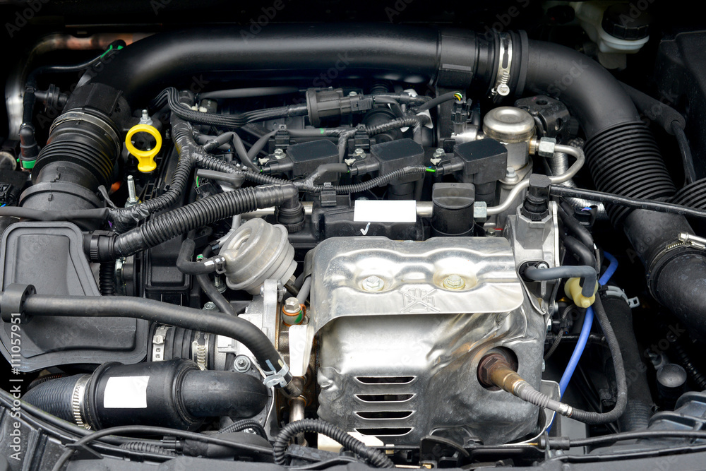 Closeup image of new 3 cylinder car engine Closeup image of new 3 cylinder car engine