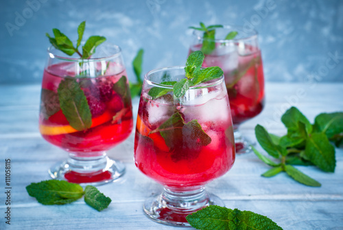 Lemonade with mint and raspberries.