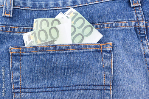 Euro money in jean pocket photo