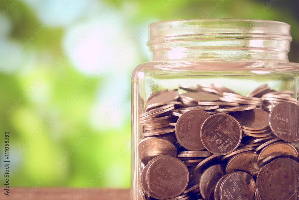 save money for investment concept money in the glass with filter save money for investment concept money in the glass with filter