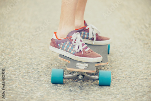 Guy riding on longboard