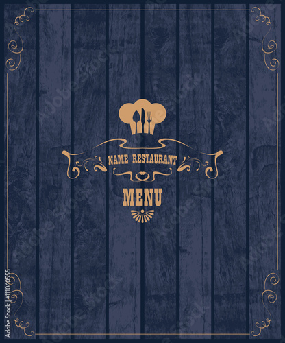 Cover for restaurant menu with a toque and cutlery on a wooden boards background texture