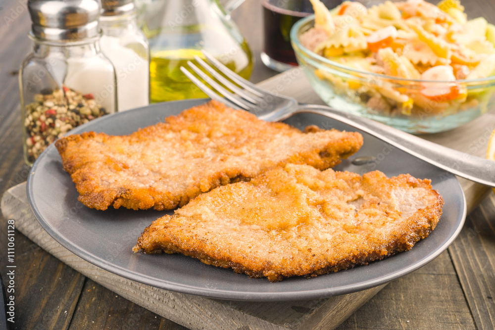 fillet breaded and fried veal; in dish fillet breaded and fried veal; in dish