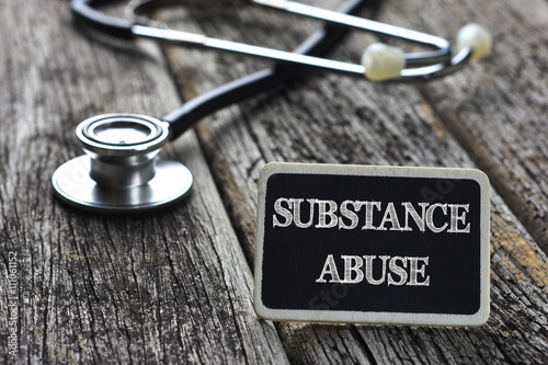 Medical Concept- SUBSTANCE ABUSE word written on blackboard with