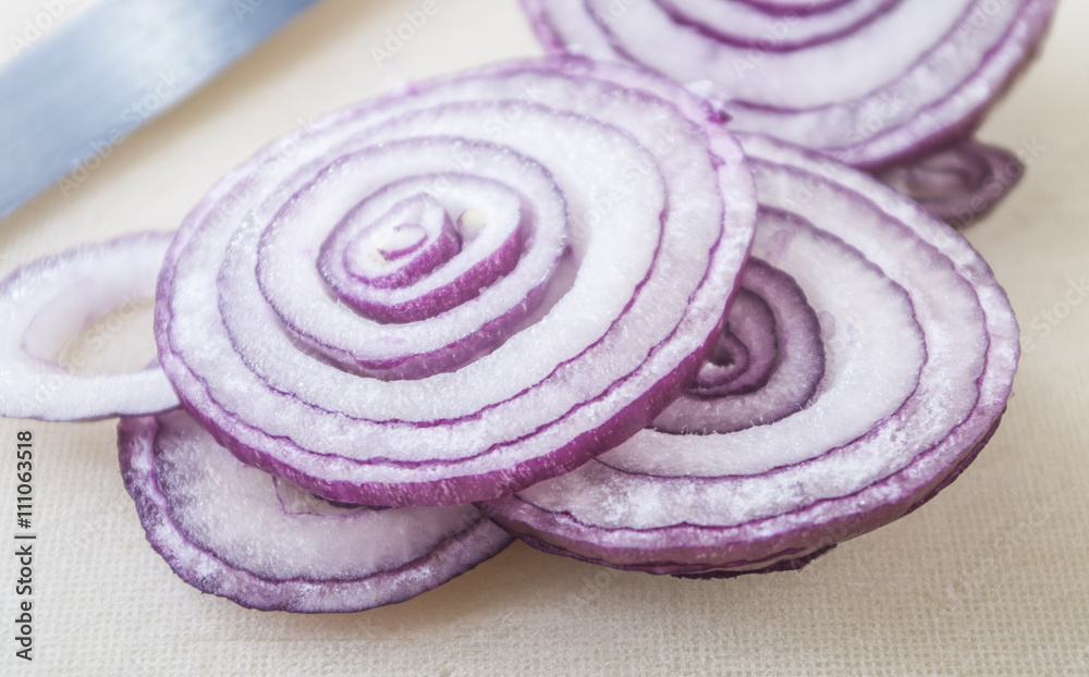 Sliced fresh red onion isolated on white background Sliced fresh red onion isolated on white background