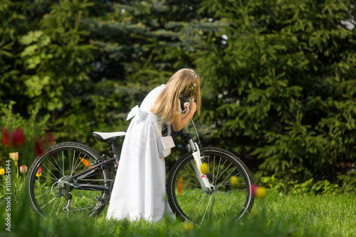 Obraz na płótnie girl going to the first holy communion
w salonie