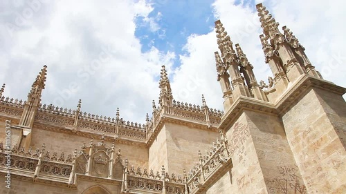 Sunny time lapse of moving clouds at Royal Chapel in Granada Cathedral, Granada town, Andalusia, Spain
