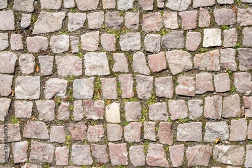 background of cobblestone with grass