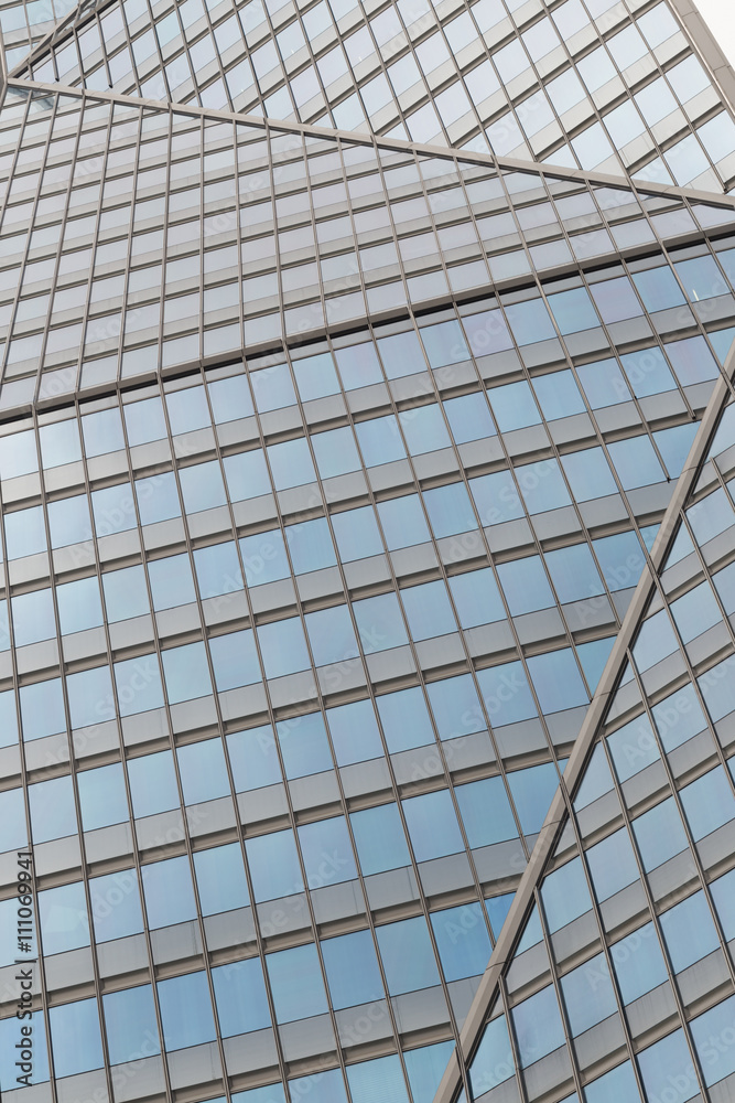 Skyscrapers with glass facade. Modern buildings in Paris business district. Concepts of economics, financial, future.  Copy space for text. Dynamic composition.