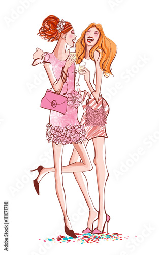 Two girls in a coktail party laughing