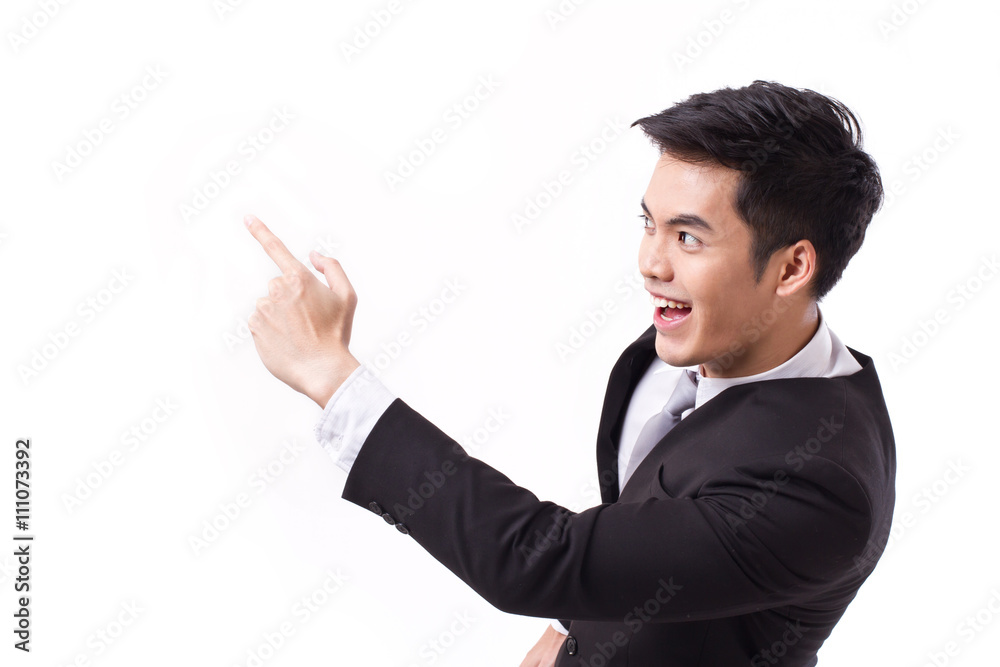successful, happy businessman pointing up at blank space successful, happy businessman pointing up at blank space