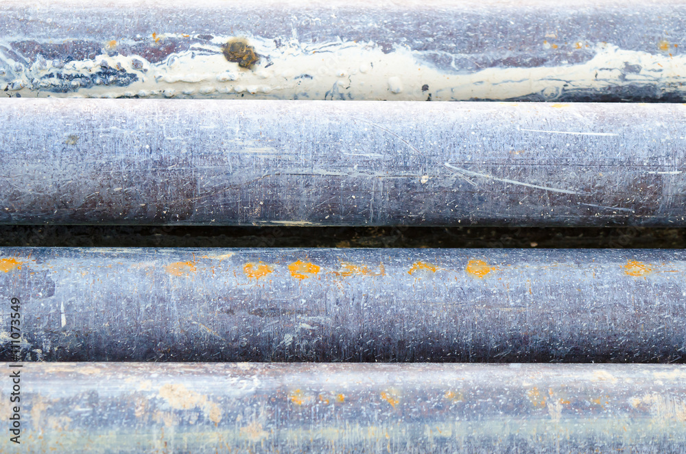 Drilling pipes stacked near rig